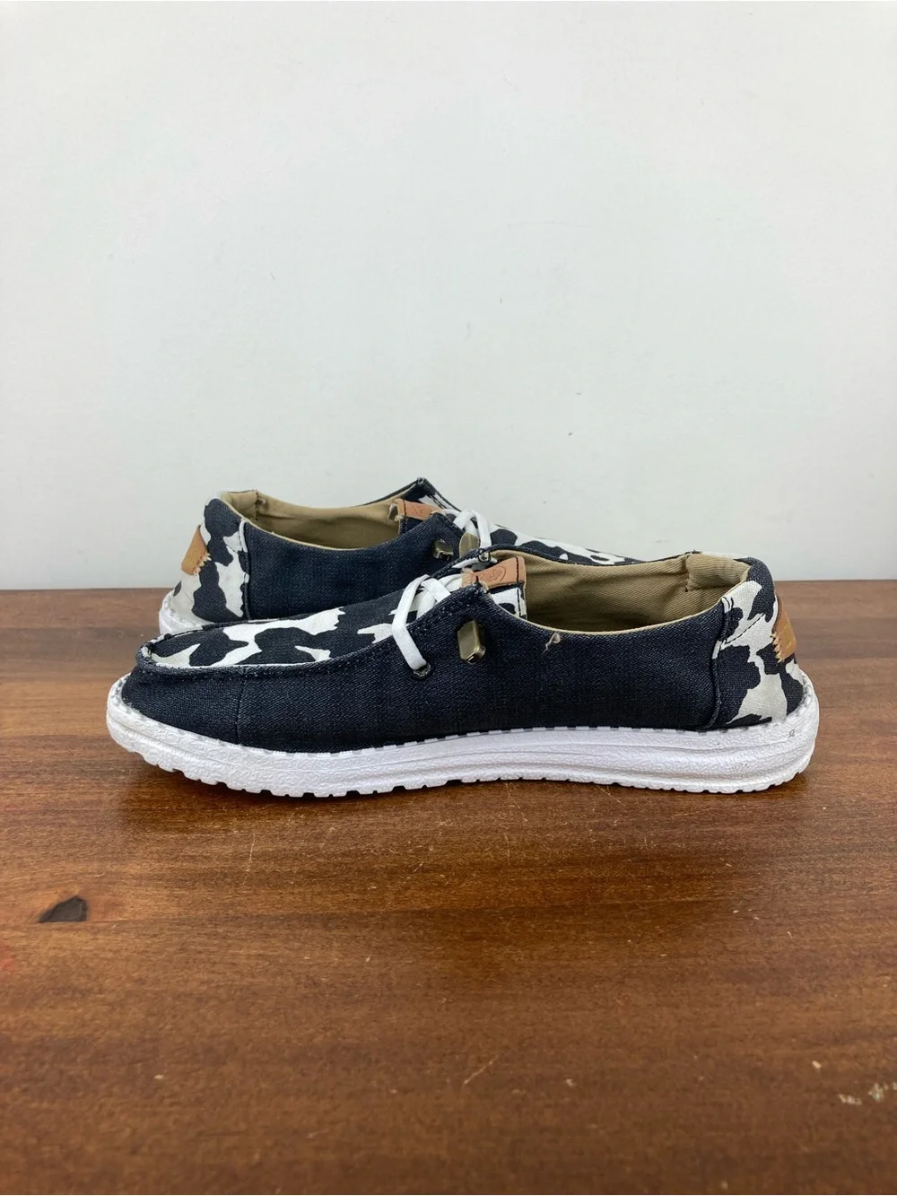 Hey Dude Wendy Animal Black Cow Print Slip-On Shoes 41037-0HO Women's Size 6.